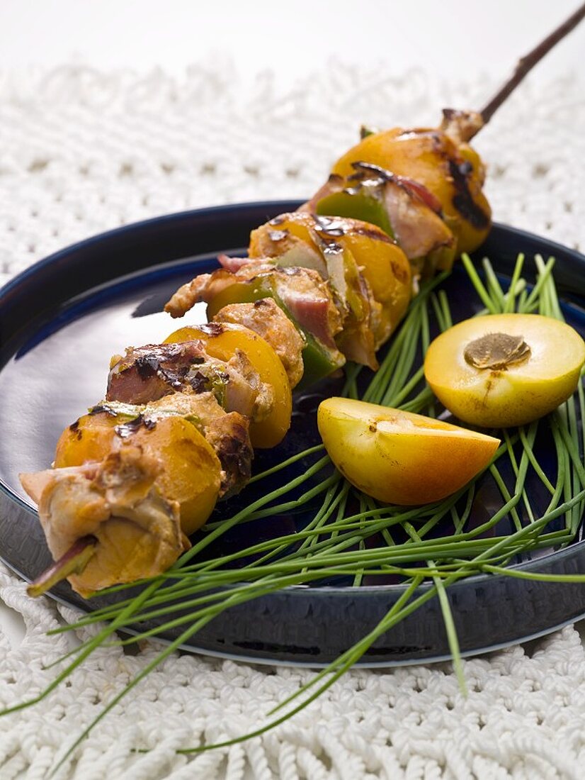 Grilled meat and peach kebab