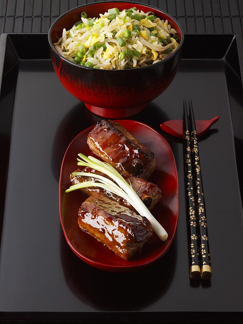 Glazed pork ribs and vegetable rice (Asia)