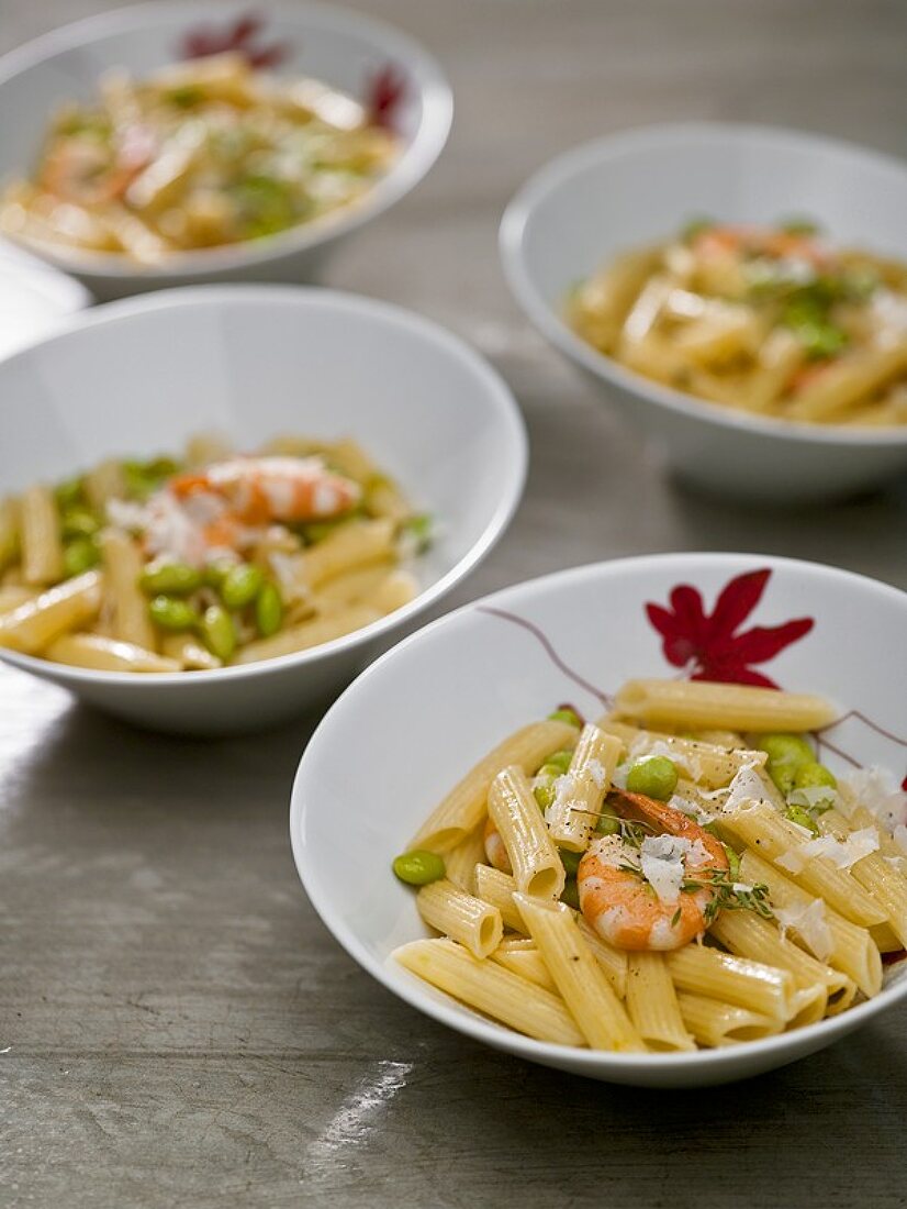 Pasta with shrimps and fresh green soya beans (edamame)