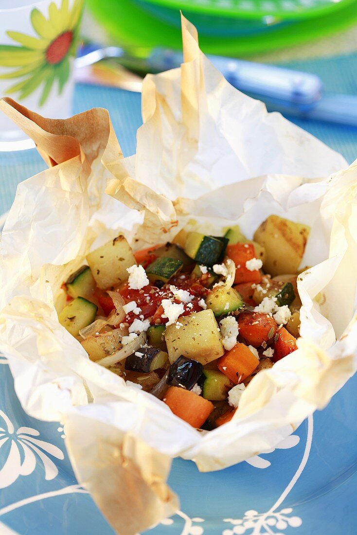 Briam (oven-baked vegetables with feta) in greaseproof paper