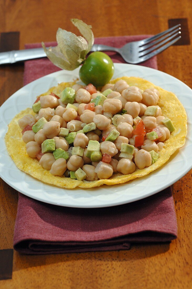 Chick-peas with avocado, tomatoes & coriander on corn tortilla
