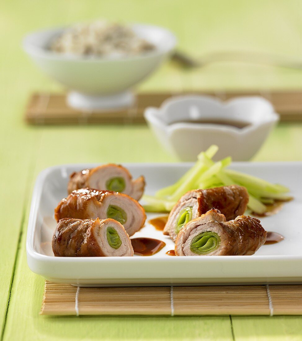 Pork and cucumber rolls with teriyaki sauce