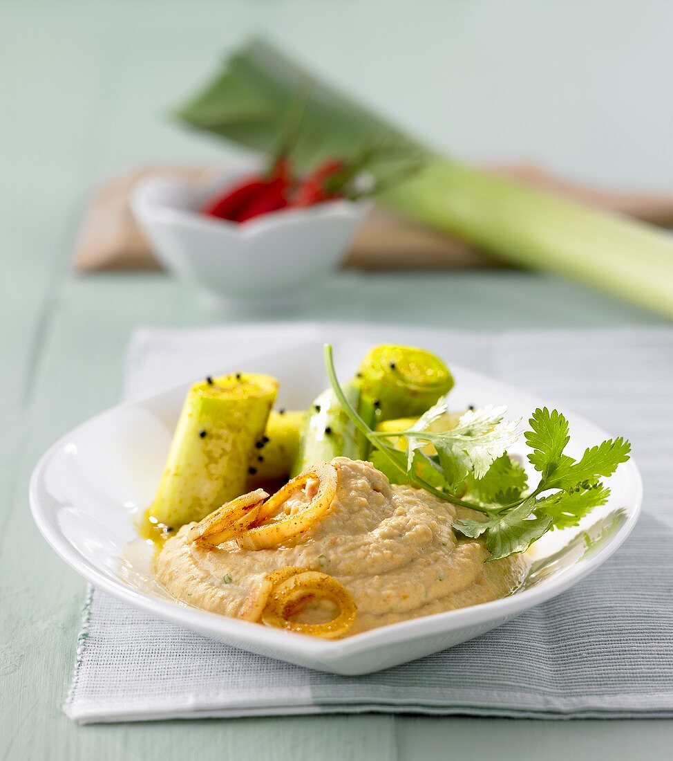 Red lentil puree with coriander, onions and leeks
