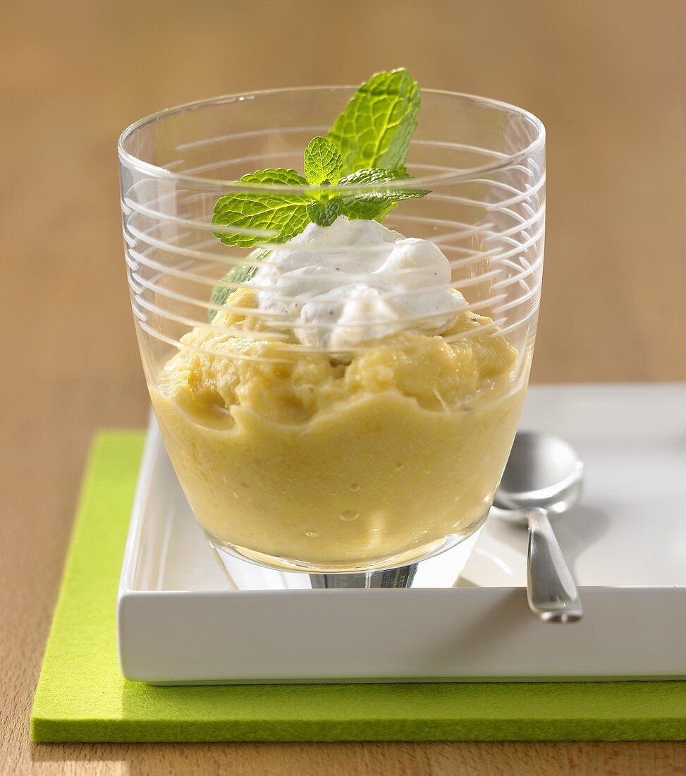 Pineapple sorbet with ginger and whipped cream