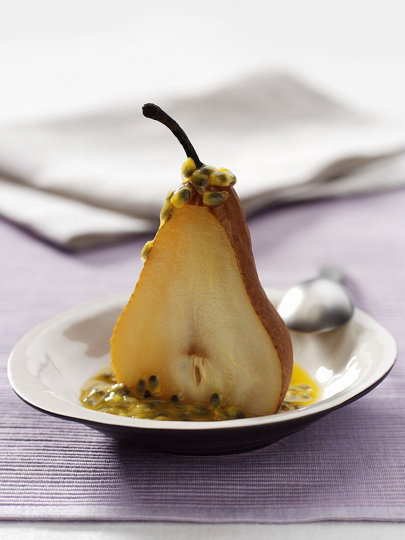 Baked pear with passion fruit sauce