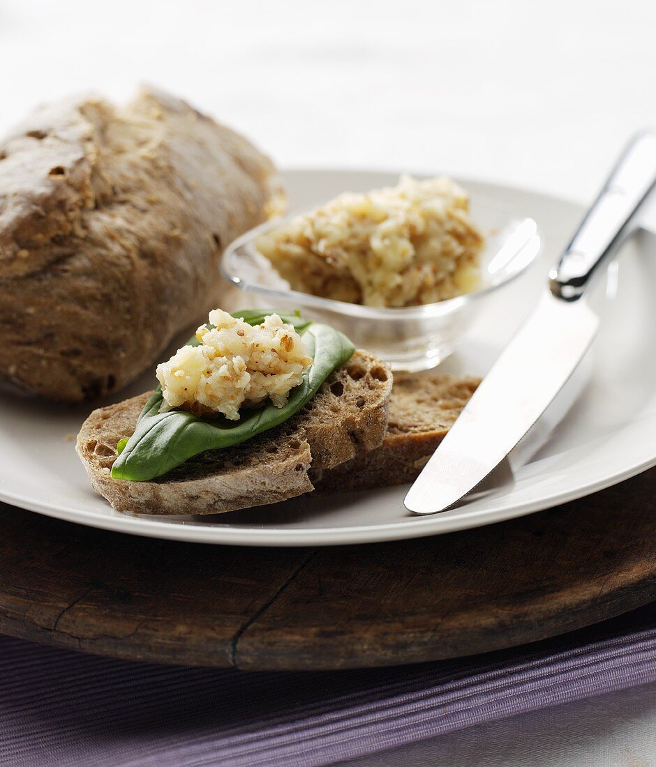 Potato spread with pine nuts on wholemeal bread