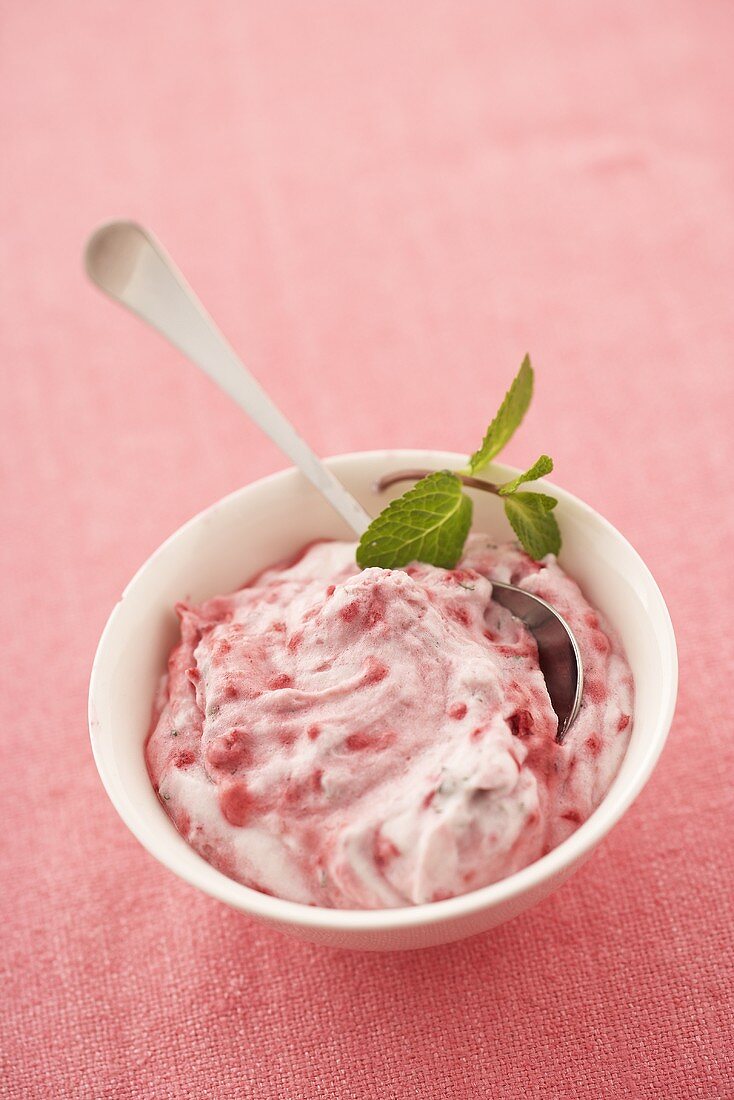 Raspberry cream with fresh mint