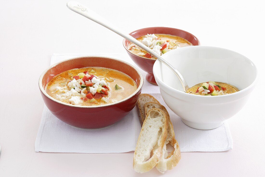 Rice soup with vegetables and sheep's cheese