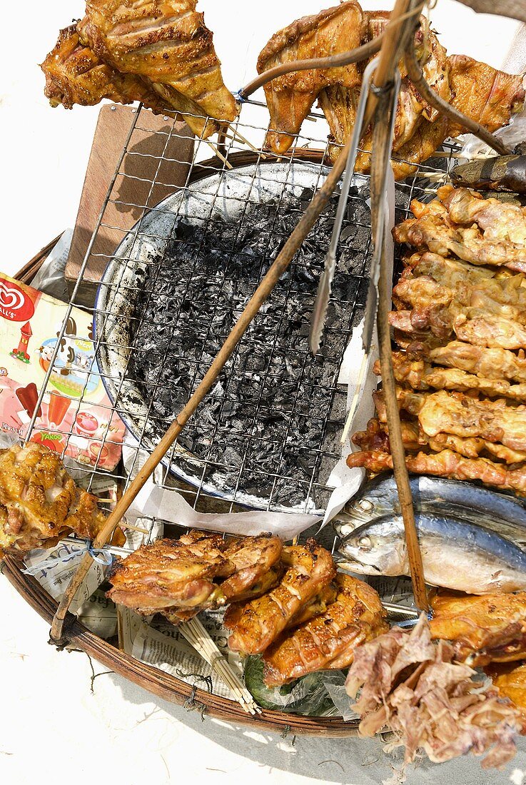 Cookshop with grilled snacks on the beach, Khao Lak, Thailand