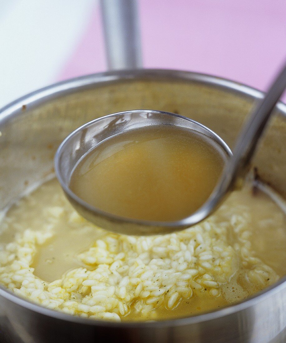 Making risotto: adding stock