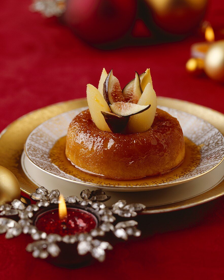 Baba au rhum (Rum savarin) with figs and pears (Christmas)