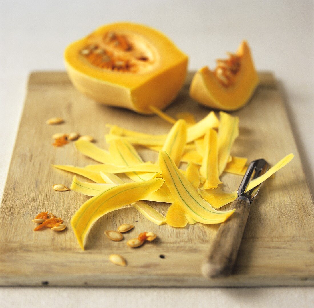 Butternut squash being peeled