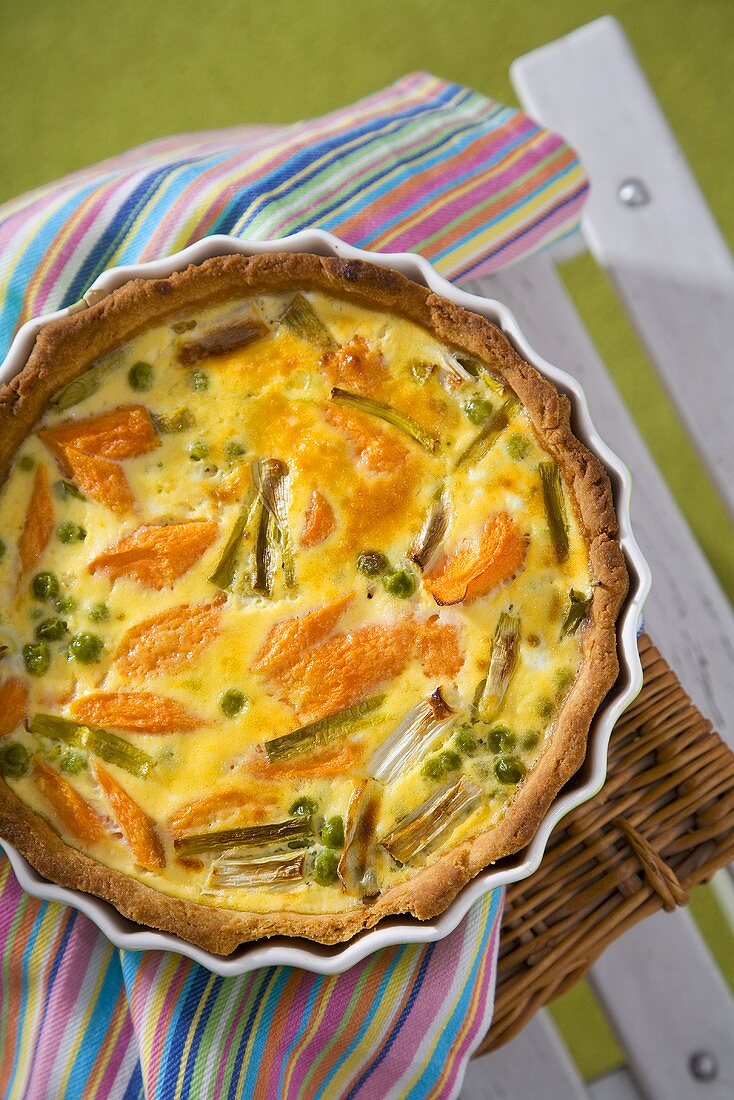 Vegetable quiche made with carrots, peas and leeks