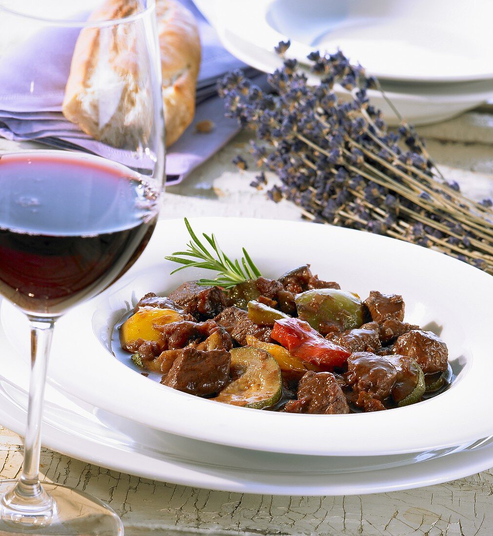 Provençal lamb ragout and a glass of red wine