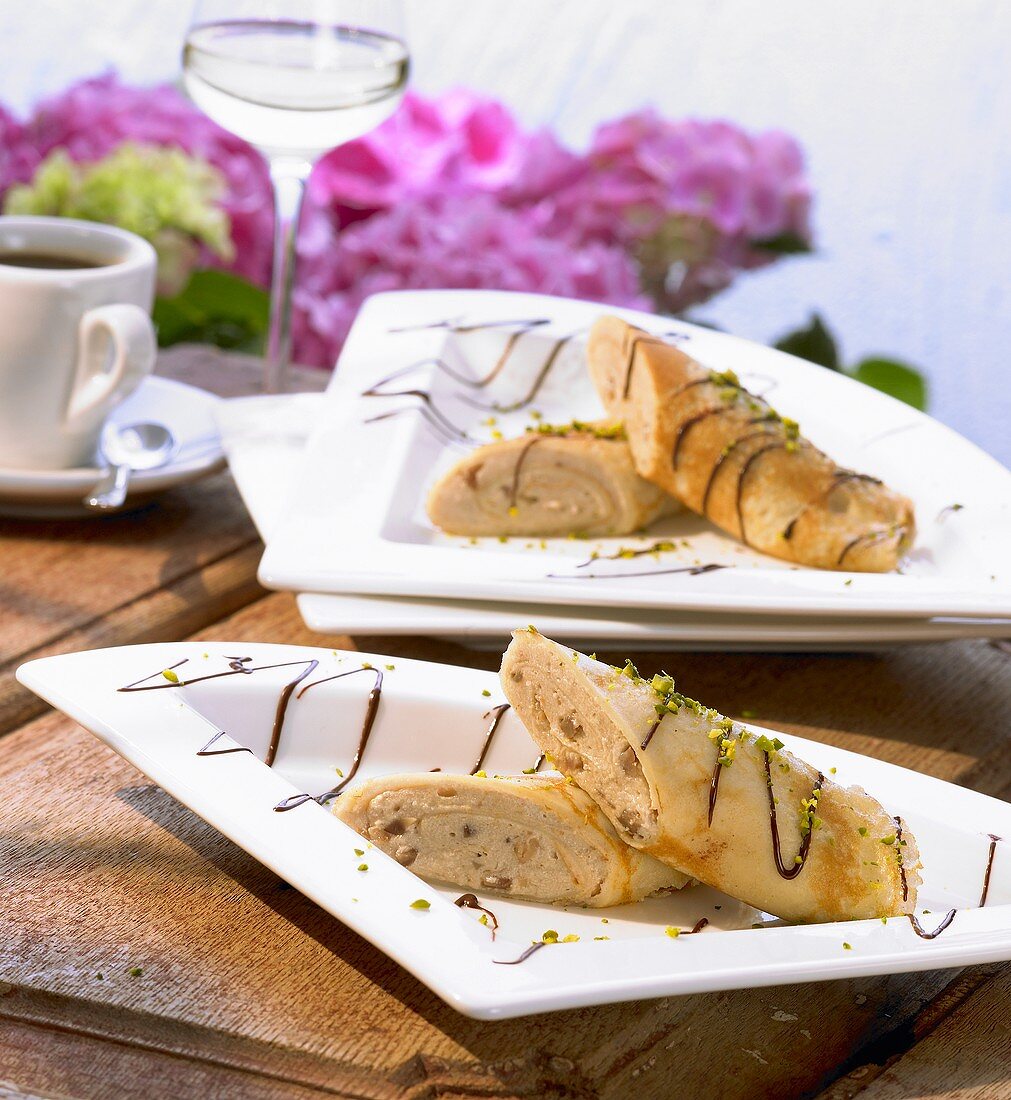 Crêpes with chestnut cream filling and chocolate sauce