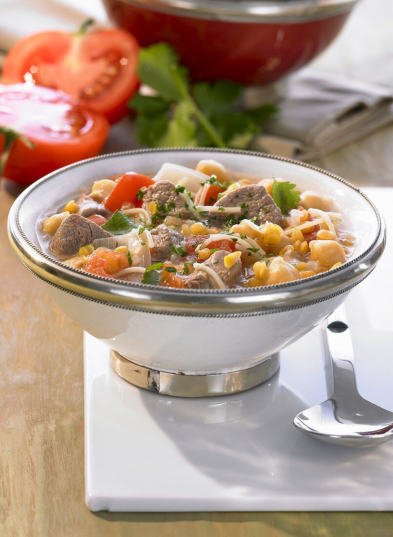 Moroccan lamb stew with lentils, chick-peas and tomatoes
