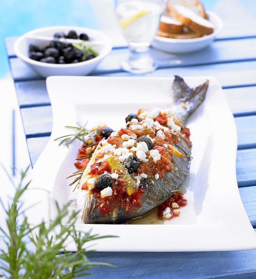A whole sea bream cooked Greek style
