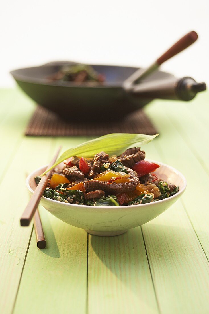 A bowl of stir-fried beef with ramsons (wild garlic) & peppers