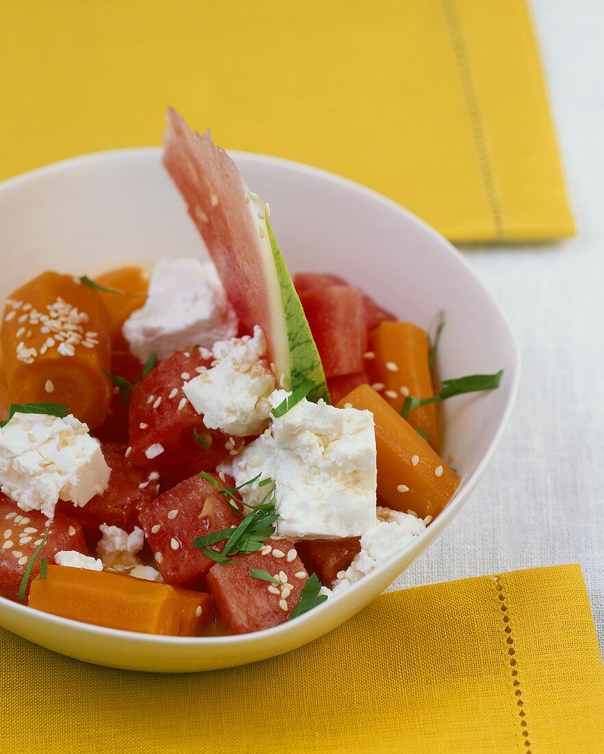Watermelon and carrot salad with feta and sesame seeds
