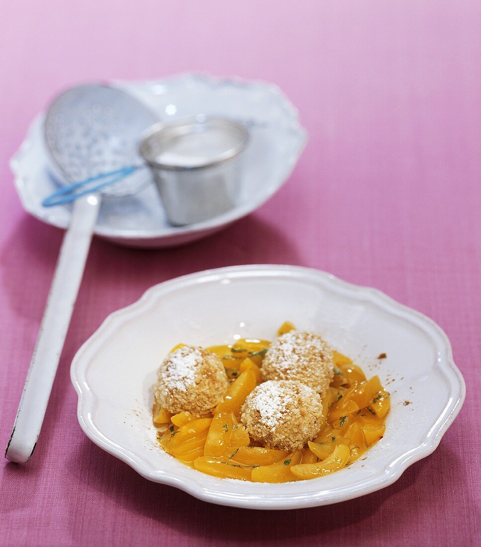 Curd cheese dumplings with marinated apricots