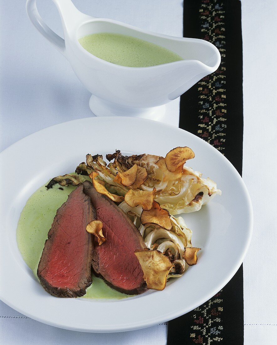 Roast rump of veal with cabbage and sorrel sauce