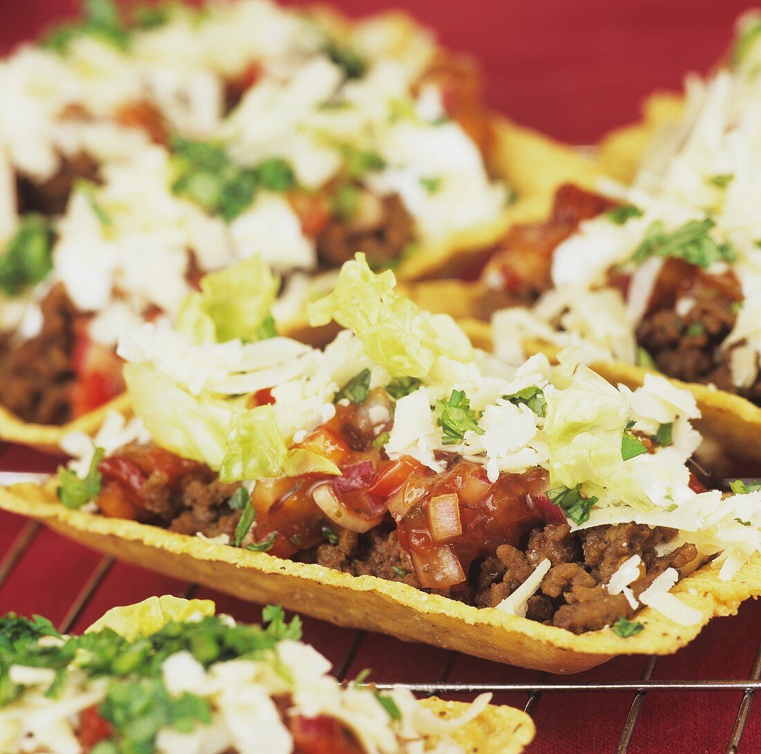 Mince and tomato salsa in taco shells