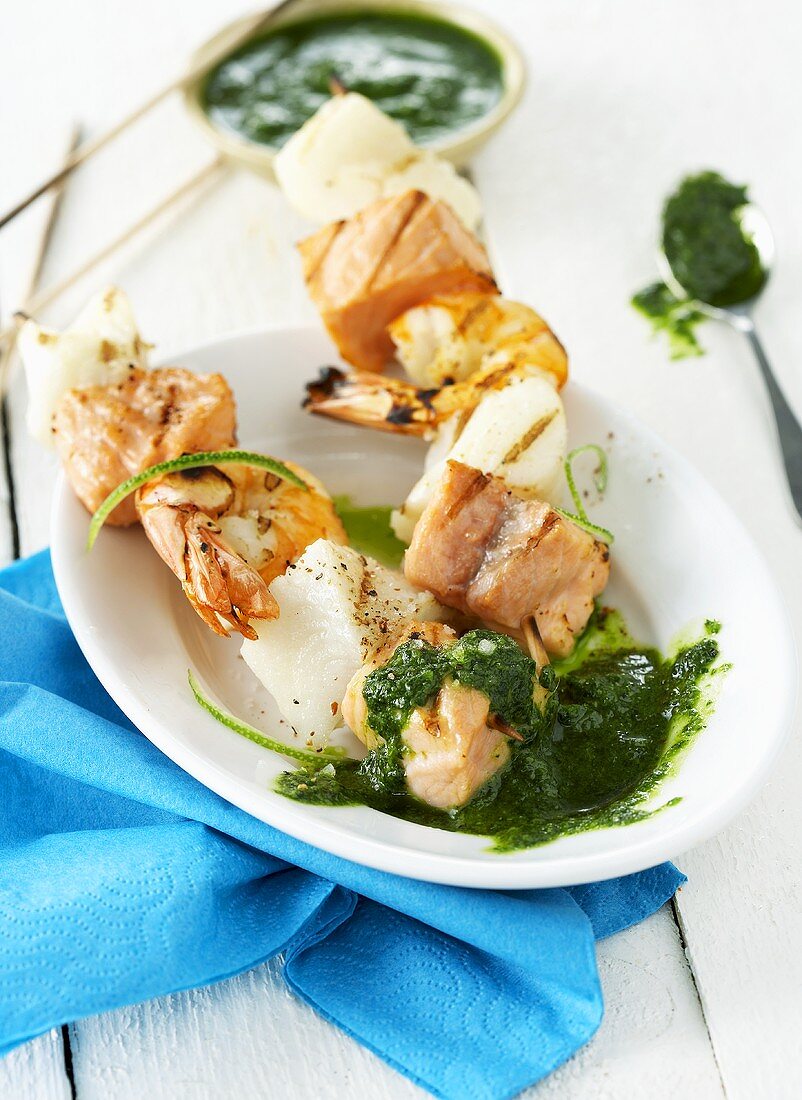 Fish kebabs with herb salsa