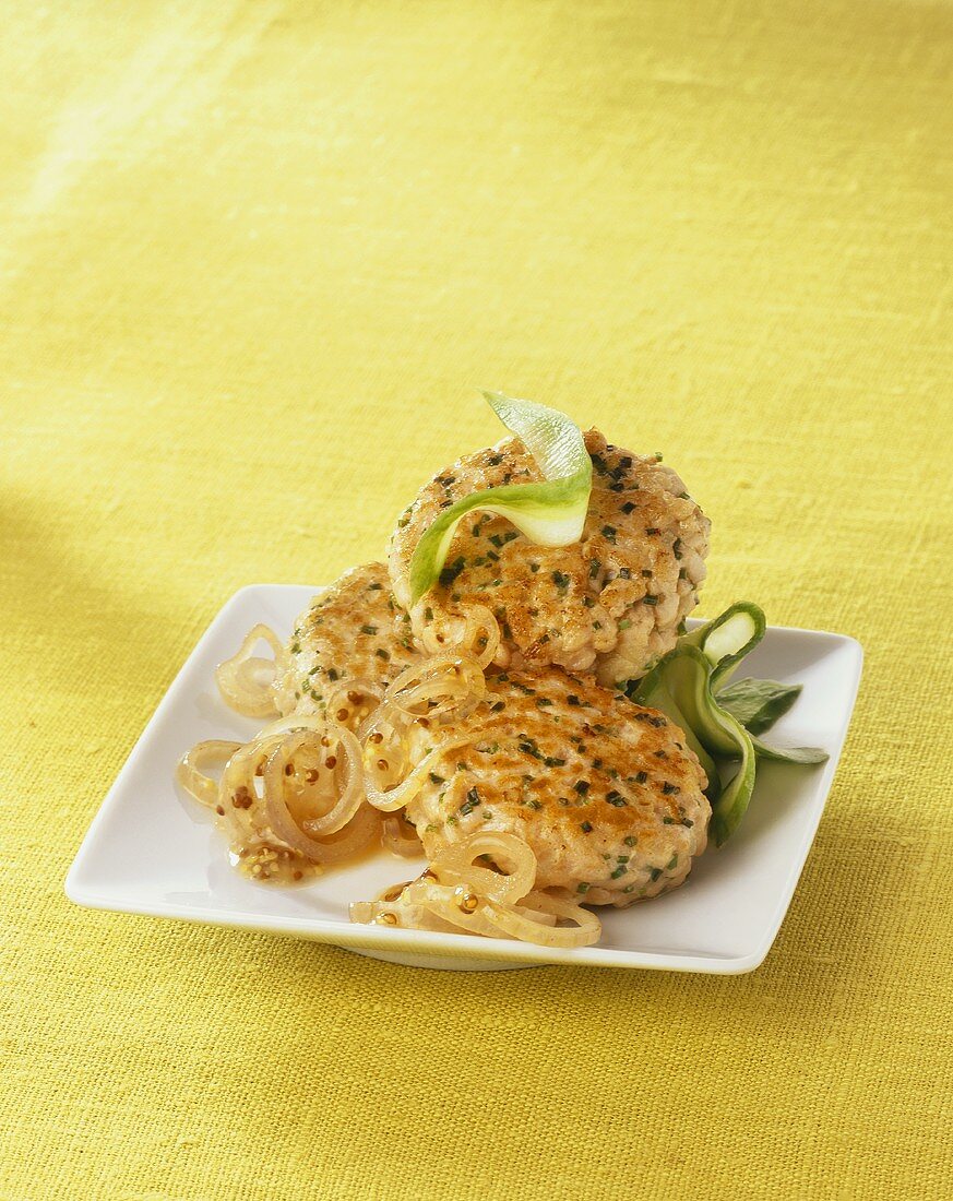 Fish cakes with mustard onions