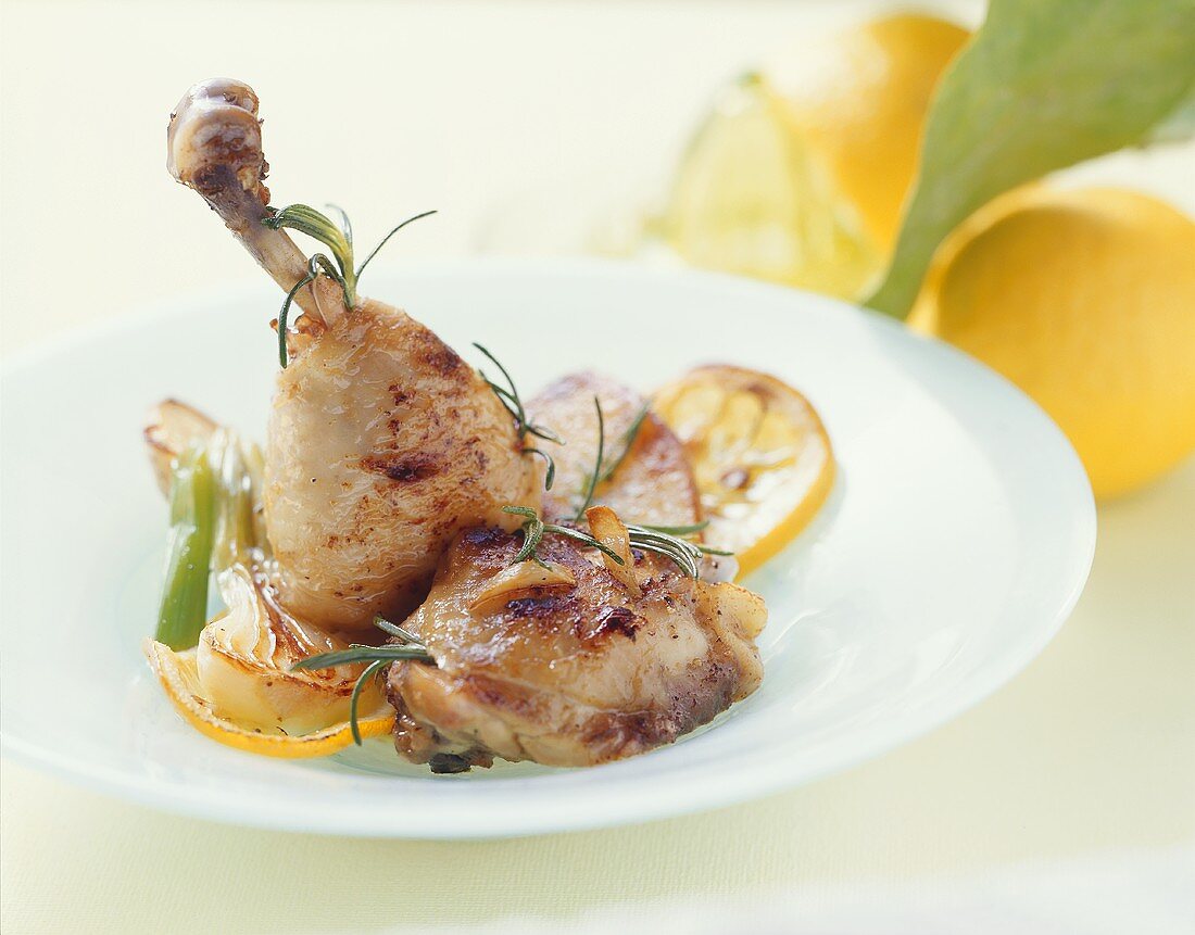 Chicken drumstick with garlic and rosemary in lemon butter