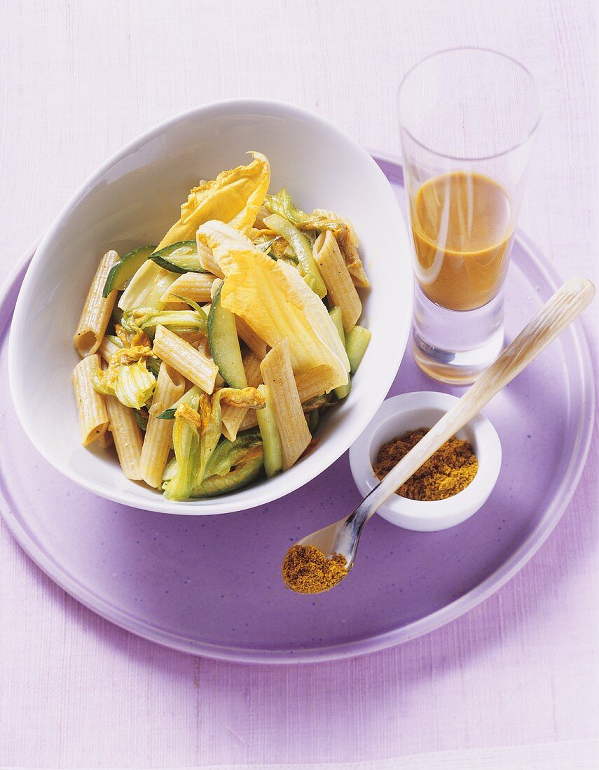 Curried pasta with courgette flowers and sea buckthorn juice