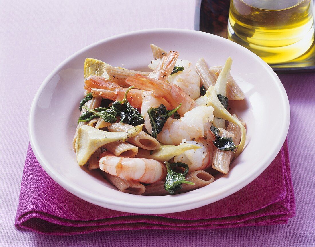 Wholemeal spelt pasta with prawns and artichokes