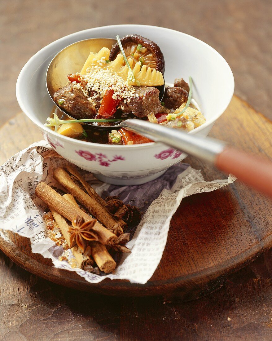 Lamb & red pepper ragout with bamboo sprouts & sesame seeds