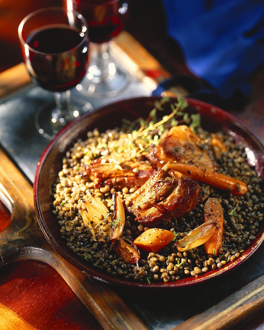 Pork ribs on lentils and carrots