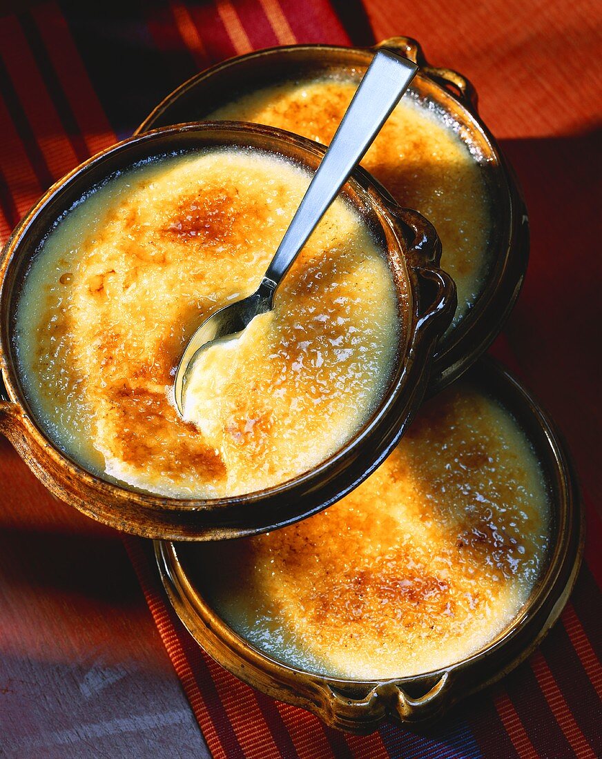 Catalan cream in three terracotta dishes