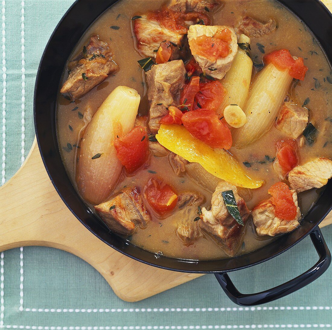 Veal stew with shallots and tomatoes