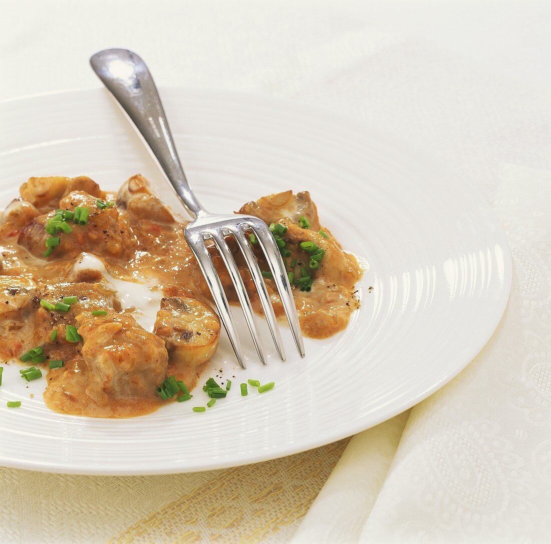 Creamy veal goulash with mushrooms