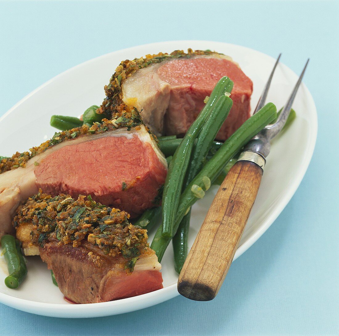 Loin of lamb with herb crust and green beans