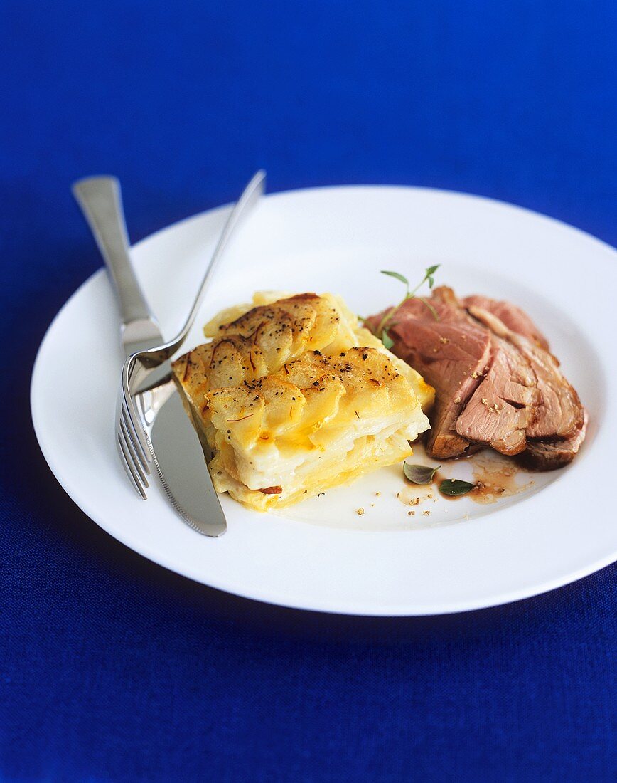 Schweinebraten mit Kartoffelgratin