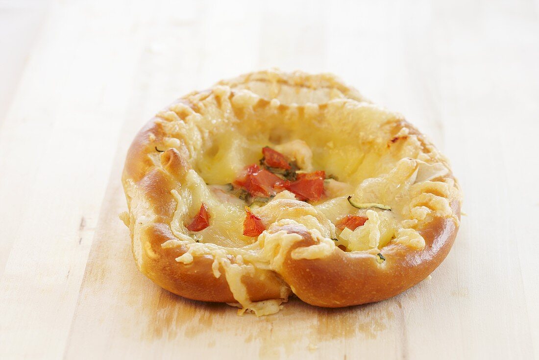 A cheese and pepper pretzel