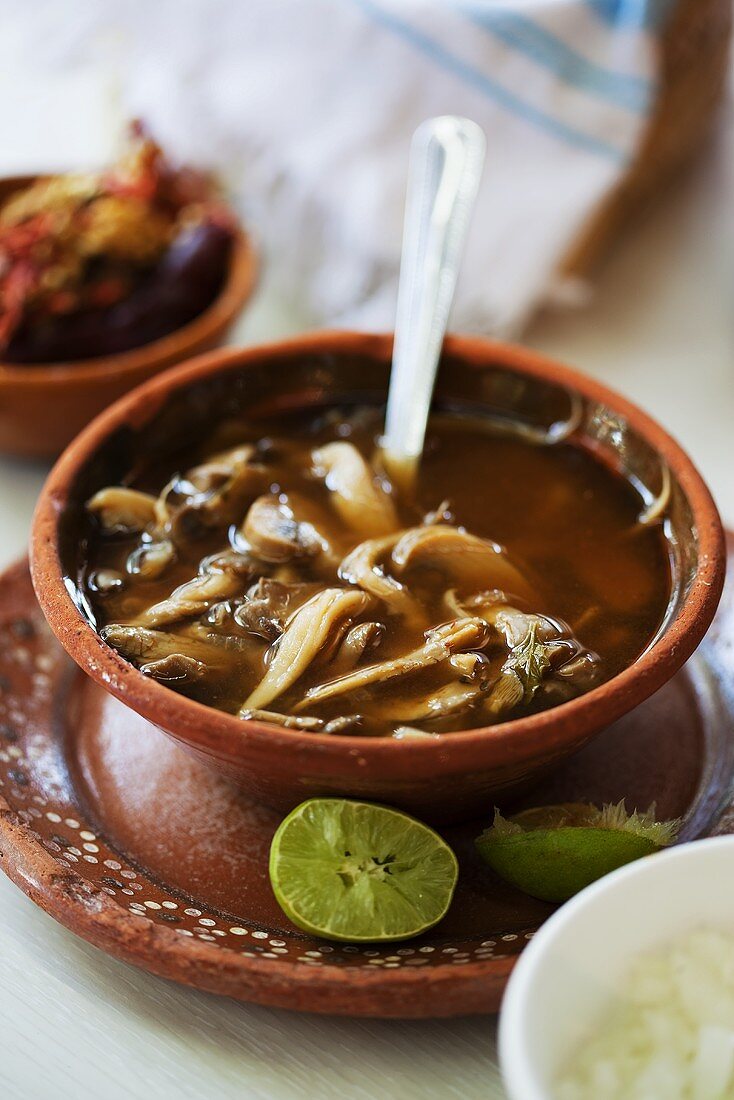 Chicken soup with mushrooms and limes (Mexico)