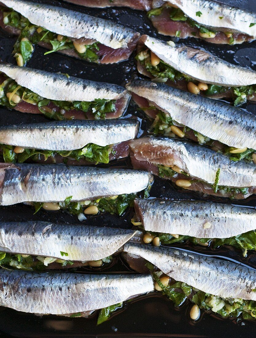 Sardines stuffed with herbs and pine nuts