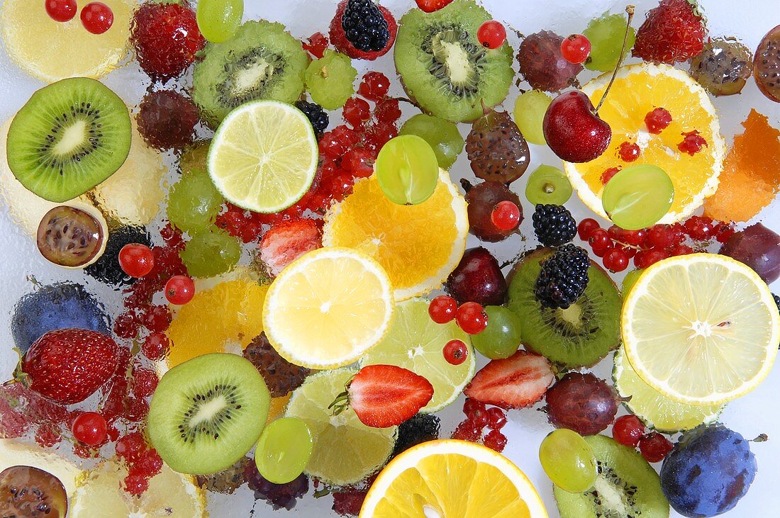 Various types of fruit in water, seen from above