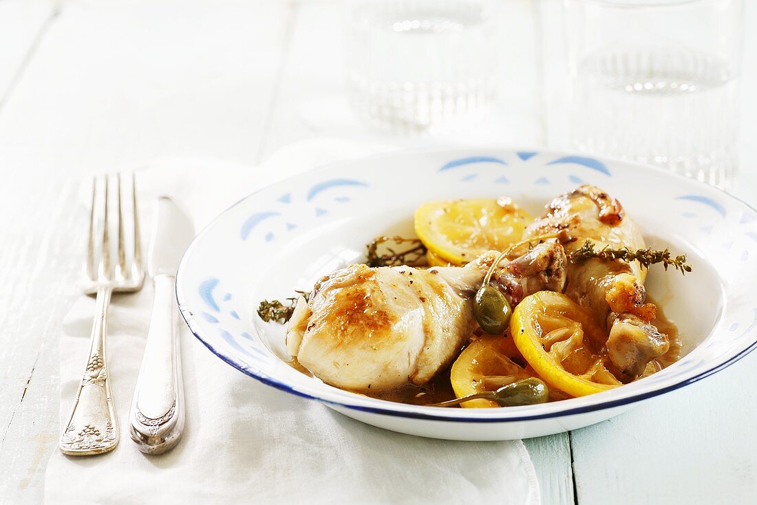 Chicken legs in a lemon and caper sauce