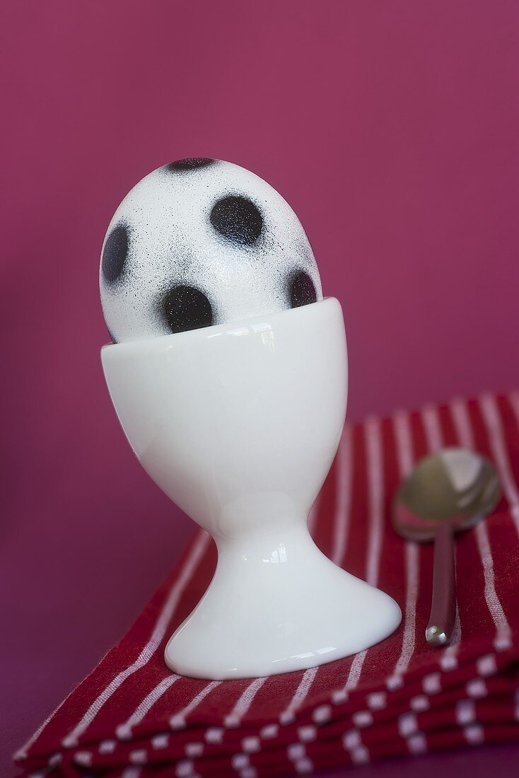 A football egg in an egg cup