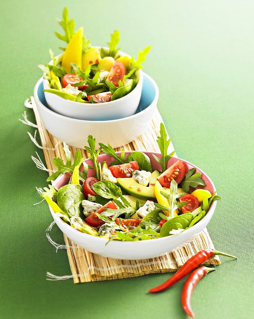 Avocado salad with rocket, mango and blue cheese