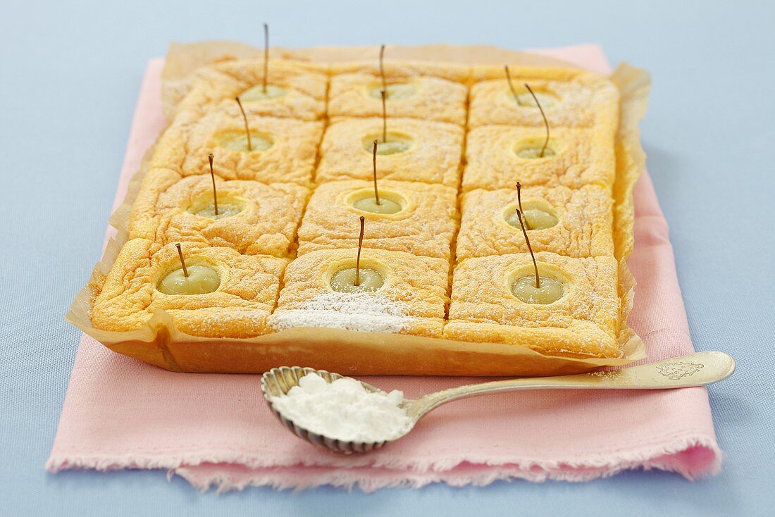 Sponge tray bake with small apples