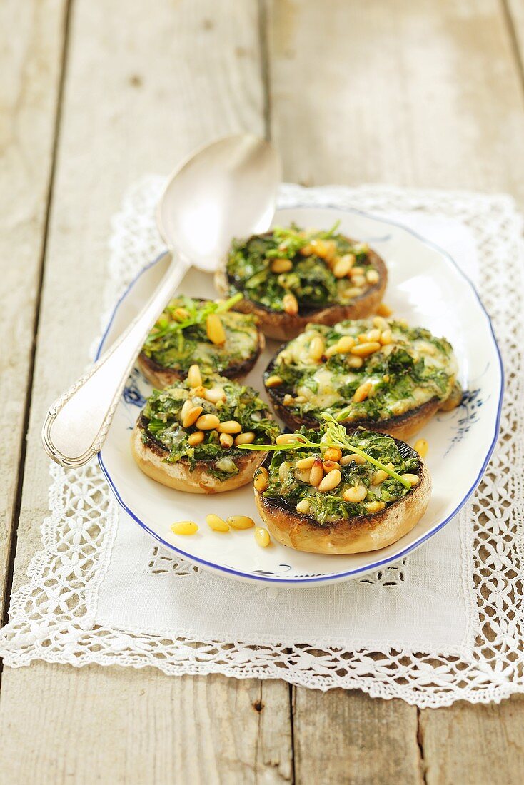 Stuffed mushrooms with rocket, blue cheese and pine nuts