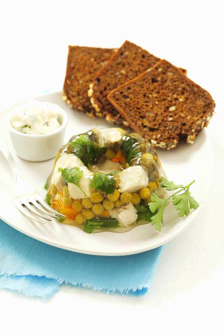 Chicken, peas, capers and parsley in aspic