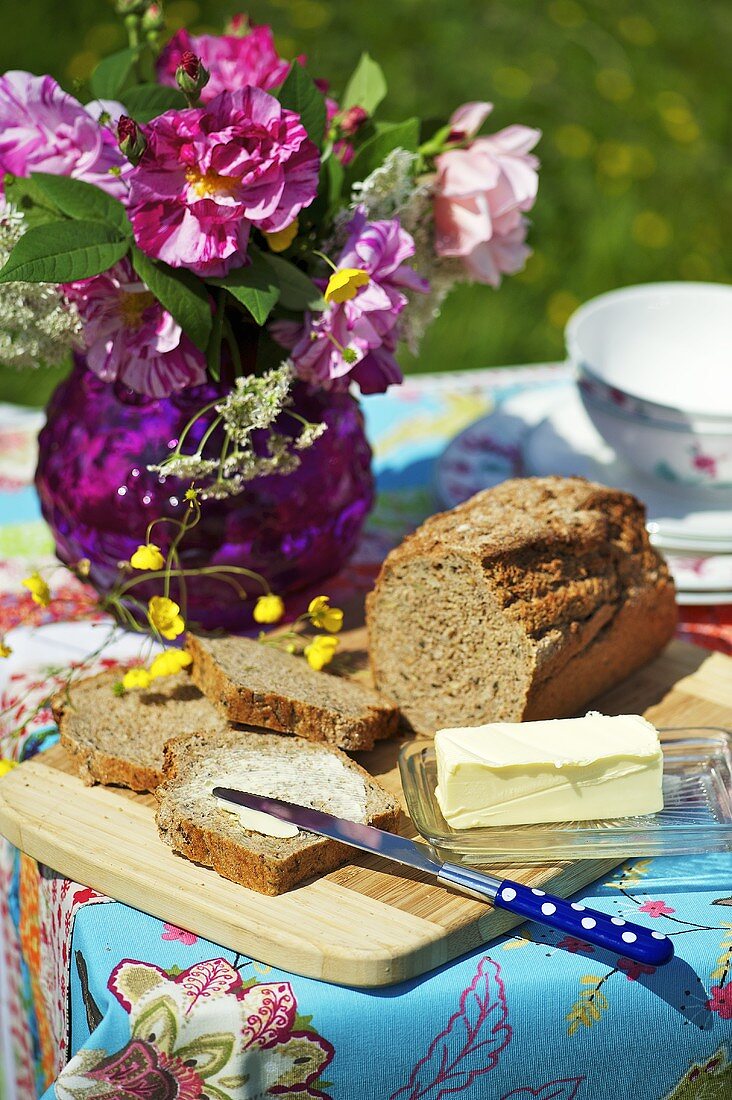 Bread and butter on a garden table