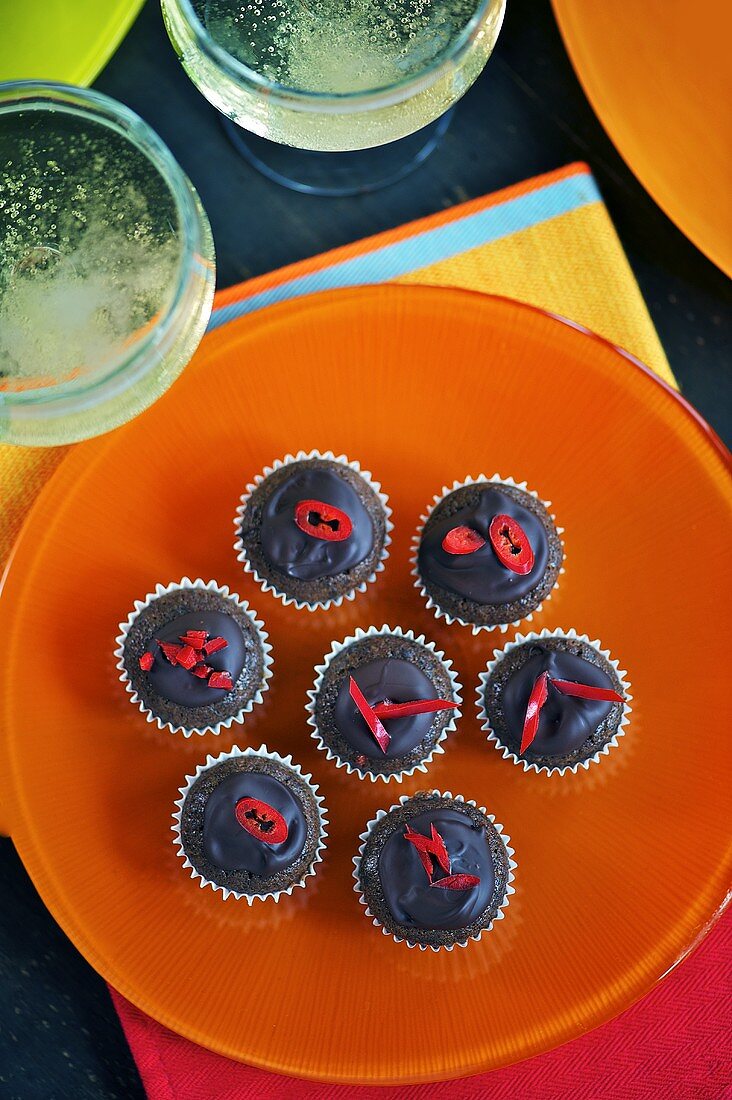 Chilli chocolate muffins and champagne, seen from above